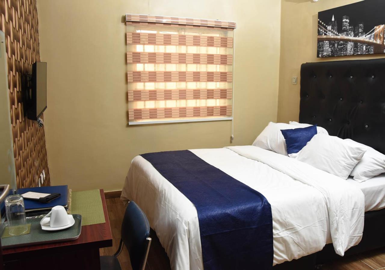 24-7 Electricity Agore Hotels And Suites Ltd Awoyaya Extérieur photo